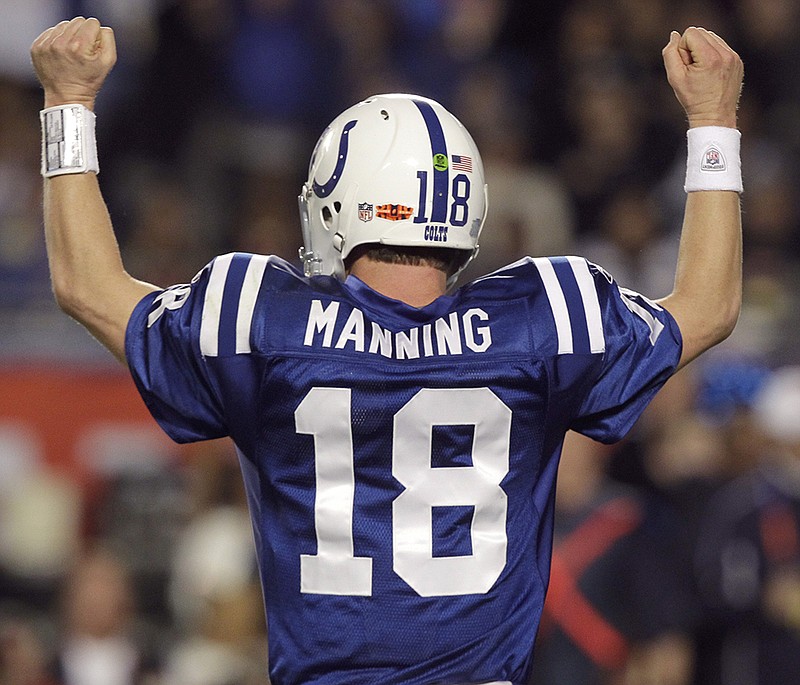 In this Feb. 7, 2010, file photo, Indianapolis Colts quarterback Peyton Manning celebrates after teammate Joseph Addai scored a touchdown during the second half of the NFL Super Bowl XLIV football game against the New Orleans Saints in Miami. A person with knowledge of the decision tells The Associated Press on Sunday, March 6, 2016, that Manning has informed the Denver Broncos he's going to retire. 