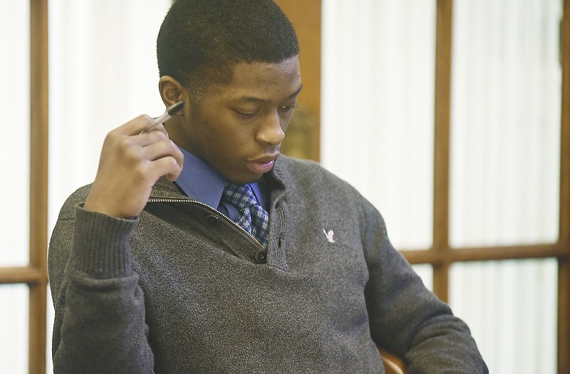 In this March 2016 photo, Charles Thompson is seated at the defendant's end of the table as he prepares for his trial in Cole County, in which he was acquitted of the killing of Johnny Evans but found guilty of burglary.