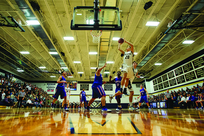 Helias guard Landon Harrison goes up for a shot during a game against Moberly this season at Rackers Fieldhouse. Harrison and the Crusaders will face St. Joseph Lafayette in the Class 4 semifinals tonight at Mizzou Arena.