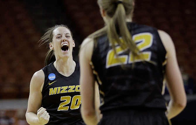 Missouri forward Kayla McDowell (20) celebrates with teammate Jordan Frericks (22) during a first-round women's college basketball game in the NCAA Tournament against Brigham Young, Saturday, March 19, 2016, in Austin, Texas. 