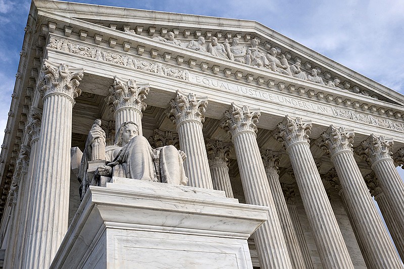 This Feb. 17, 2016, file photo, shows the Supreme Court in Washington. Challengers in two politically tinged cases at the Supreme Court this week face the seemingly insurmountable problem of being unable to count the five votes they need to prevail. The death of Justice Antonin Scalia has deprived conservatives of a reliable vote on a range of issues, and two of them are coming before the court. 