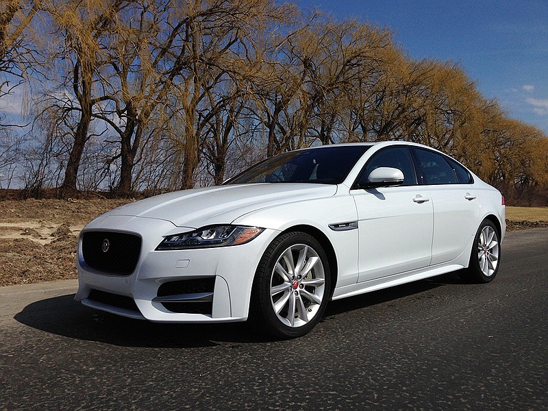 The fully redesigned 2016 Jaguar XF luxury sport sedan doesn't look much different from the outgoing model. The wheelbase is 2 inches longer, the front overhang is shorter, so it looks a tad sportier, but the long nose with the bulging hood and the sharp coupe lines remain. 