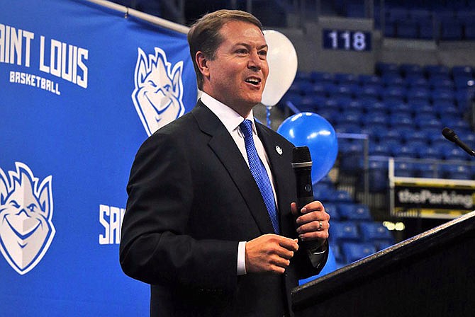 Travis Ford, Saint Louis University's new mens' basketball, speaks during a press conference Thursday, March 31, 2016, at Chaifetz Arena in Saint Louis. Ford, who was fired by Oklahoma State this month after going 155-111 in eight seasons with five NCAA Tournament appearances, replaces Jim Crews. (J.B. Forbes/St. Louis Post-Dispatch via AP)