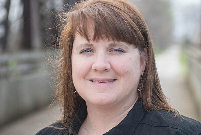 Pictured on the Missouri State Park's Katy Trail, Dawn Fredrickson recently moved from working seven years as the Katy Trail coordinator to grants management.