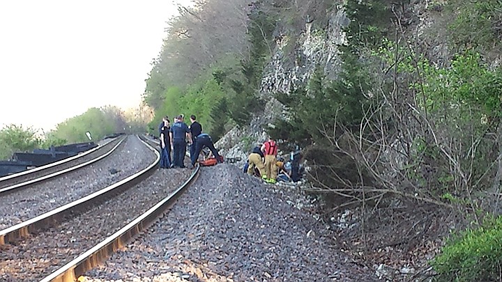 The victims were taken from the fall site near the old Renns Prison and carried over the railroad tracks and then put in a stretcher where firefighters took them down to a sand bar to meet the boat which took them to the Noren River Access where a helicopter and ambulance were waiting.