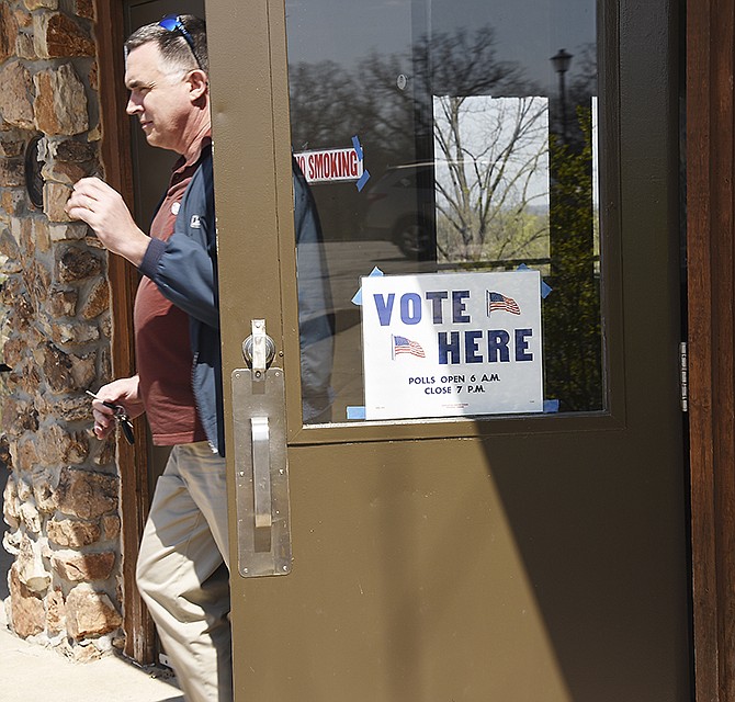 Jon Geers exits McClung Park pavilion after casting his ballot in the Ward 5, Precinct 1 polling place. Although there were only two questions on the ballot, Geers, who has lived inside the city limits for eight years, said he wouldn't miss the opportunity to vote.