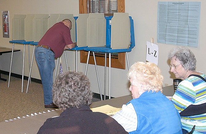A Moniteau County citizen casts his vote early on April 5, 2016.