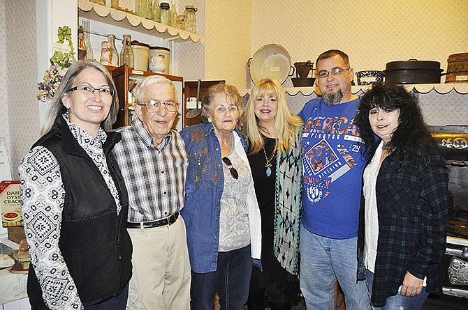 Family members gathered at the Ray County Museum to celebrate their reunion with Nancy Stanley, who was given up for adoption 51 years ago. From left: Brenda Drummond, Kenneth Endsley, Judith Endsley, Nancy Stanley, Tony Beasley and Cynthia Beasley. 