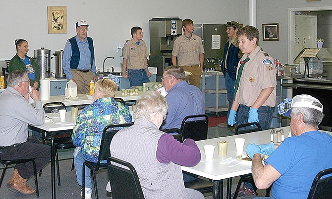 California Kiwanis members and members of Boy Scout Troop 120 wait to serve people who came to enjoy pancakes and sausage at the annual Kiwanis pancake and sausage breakfast fundraiser Saturday, April 9, 2016.