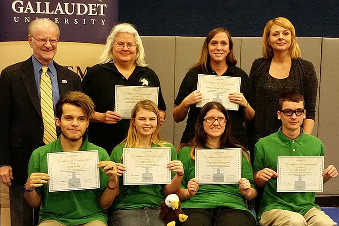 From left, back row: Alan Hurwitz, Gallaudet University president; Debbie Burnaman, MSD teacher; Jennifer Morales, MSD teacher; and Sheri Cook, director of Gallaudet University Regional Center - Midwest. MSD students in front row: Cody Avila, Melissa Davis, Cheyenne Grotpeter and Chris Scott.