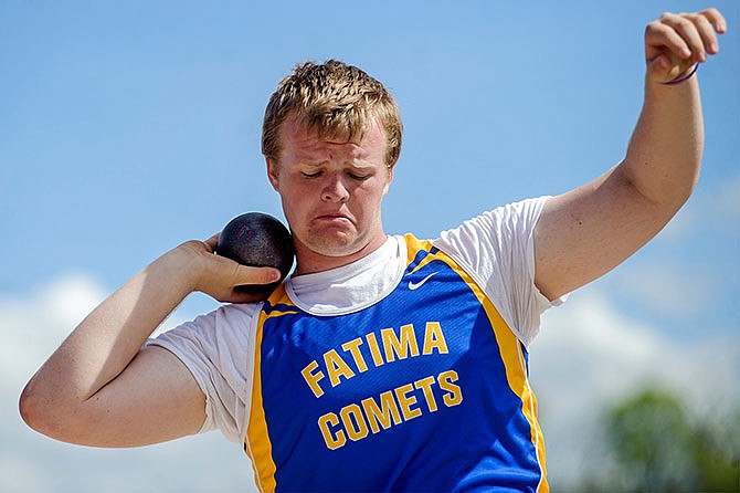 Sam Williams of Fatima gets ready to compete in the shot put Saturday at Adkins Stadium.