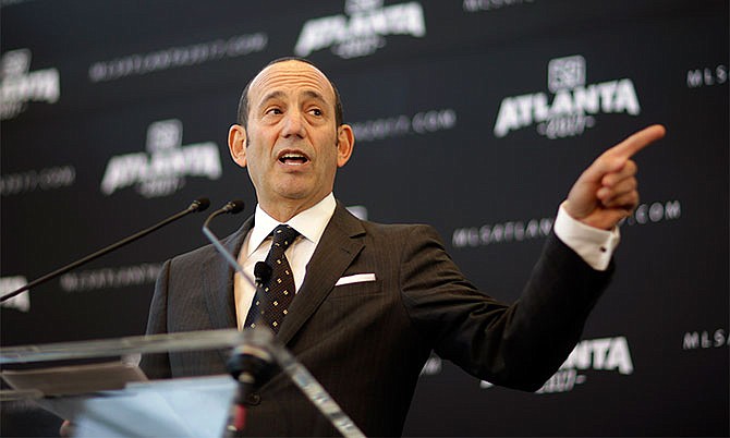 In this April 16, 2014, file photo, Major League Soccer Commissioner Don Garber speaks during a news conference in Atlanta, announcing the city will be getting an MLS expansion team. Garber, speaking with the Associated Press Sports Editors on Thursday, April 21, 2016, says St. Louis and Sacramento, California, are the leading candidates for the next round of expansion.