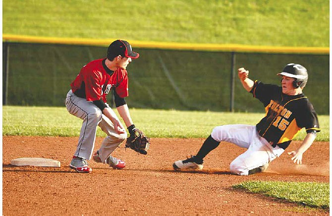 Fulton senior right fielder Trenton Clines safely steals second base in the fifth inning of the Hornetsâ€™ 6-3 NCMC victory over Hannibal on Thursday night at the high school athletic complex.