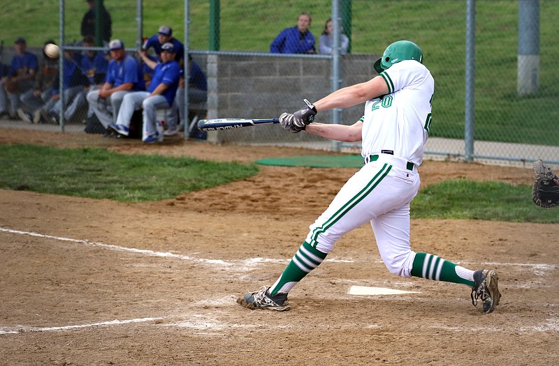 Blair Oaksâ€™ Cole Stockman launches a solo home run during the sixth inning of Thursday nightâ€™s game against Fatima in Wardsville.