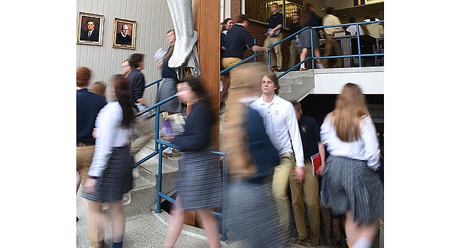 In this March 2, 2016 file photo, students fill the stairwell at Helias Catholic High School during class change.