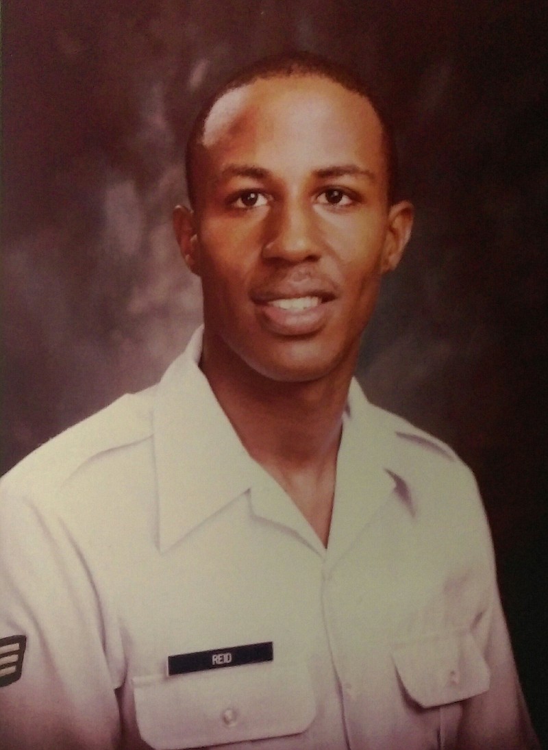 A 23-year-old Martin Reid is pictured in U.S. Air Force uniform while serving at Clark Air Base in the Philippines in 1985. 