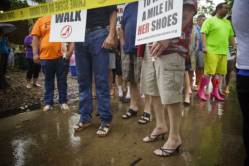 Hairy legs and high heels line up at the start of the 14th Annual Walk a Mile in Her Shoes fundraiser hosted in June 2015 by the Jefferson City Rape and Abuse Crisis Service at Memorial Park.