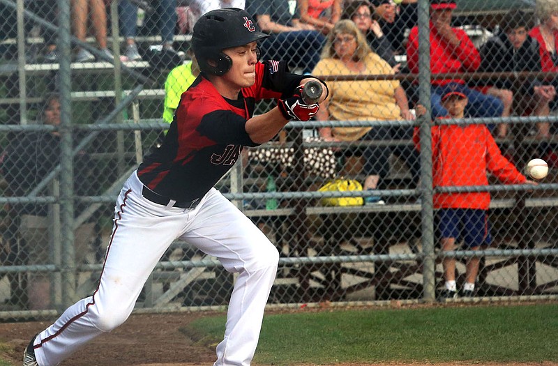 Jefferson Cityâ€™s Blaine Meyer puts down a bunt during Tuesday nightâ€™s game with Lebanon at Vivion Field.