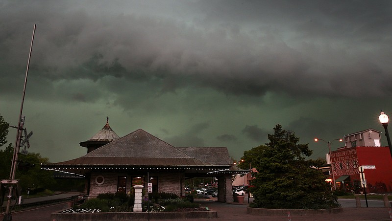 Storms clouds form above the Amtrak Station in Kirkwood, Mo., Tuesday, April 26, 2016.