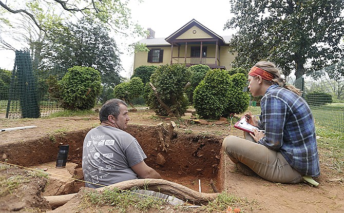 Archaeologist Nick Bon-Harper, left, talks to colleague Samantha Hunt last week as they dig on site of the home of President James Monroe in Charlottesville, Virginia. The James Monroeâ€™s Highland foundation is hoping to locate the corner foundation of the original home which burned in the mid-1800â€™s. 