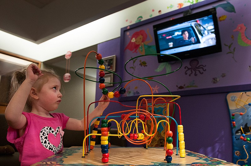 Emily Burt plays in Abby's Alcove, a new playroom at Temple Memorial Rehabilitation Center, during an open house and playroom dedication Thursday, April 28, 2016. Abby's Alcove is dedicated in memory of Abby Hanway, who passed away from rhabdomyosarcoma, a rare malignant tumor involving muscle tissue, in February 2014.
