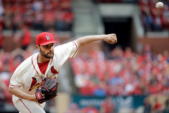 St. Louis Cardinals starting pitcher Jaime Garcia throws during the first inning of a baseball game against the Washington Nationals Saturday, April 30, 2016, in St. Louis.