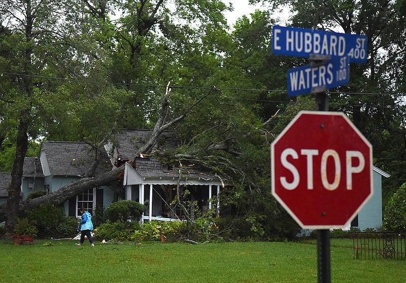 A tree fell through a home on E. Hubbard Street in Lindale Friday April 29, 2016 in Tyler. Possible tornado activity near occurred in the East Texas area Friday April 29, 2016.