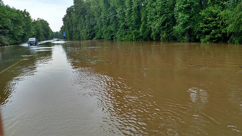 U.S. Highway 71 at Kiblah, Ark., is covered in water Saturday, April 30, 2016  from overnight rainfall. The flooded area is less than 3 miles from the state line and about 5.5 miles the Spring Bank Ferry landing on the Red River.