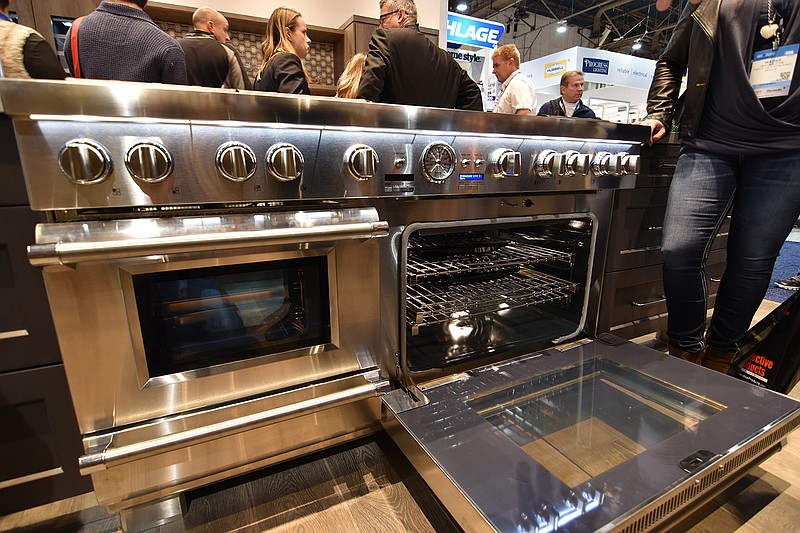 This January 2016 photo shows a Thermador introduced new 60-inch wide, 6-burner Pro Grand range that comes with either two convection ovens, or - as shown here - an arrangement that features a standard convection oven, a steam/convection oven and a warming drawer, at the Kitchen & Bath Industry Show in Las Vegas. 