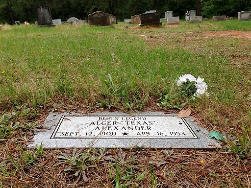The burial site of Texas blues legend Alger "Texas" Alexander is shown on April 13 at Longstreet Cemetery in Montgomery County, Texas.