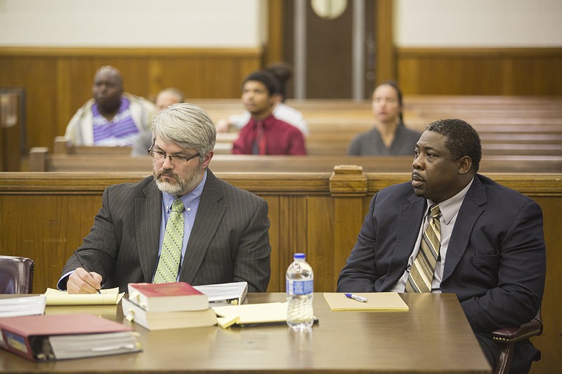 Marvin Stanton sits at the defense table during the first day of his murder trial at the Miller County Courthouse in downtown Texarkana. Stanton is accused of shooting Jessie Hamilton in a fight that began over a parking space Sept. 25 at the Raceway gas station on State Line Avenue in Texarkana, Ark.