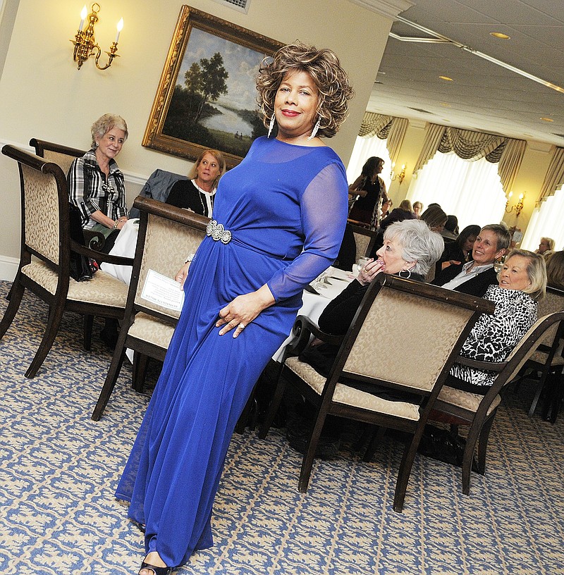 Bernadette Miller models clothing from Saffees during the Cole County Historical Society's 2014 fashion show and luncheon fundraiser.