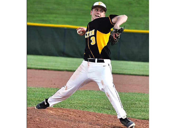 Junior starter Luke Gray delivers a pitch during the Hornetsâ€™ 14-9 first-round win over Moberly on Tuesday night in the 22nd-annual Fulton Tournament at the high school athletic complex.