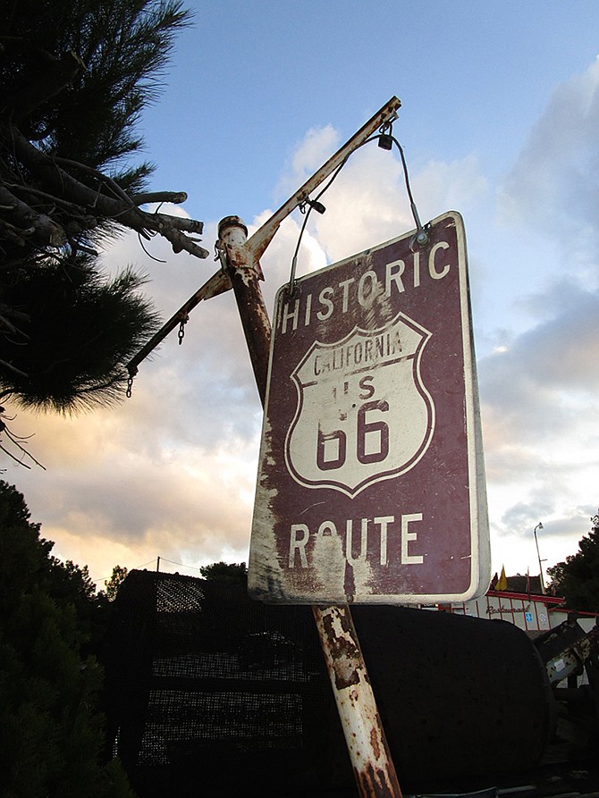 A Route 66 sign is seen near the historic Summit Inn at the end of Cajon Pass in California.