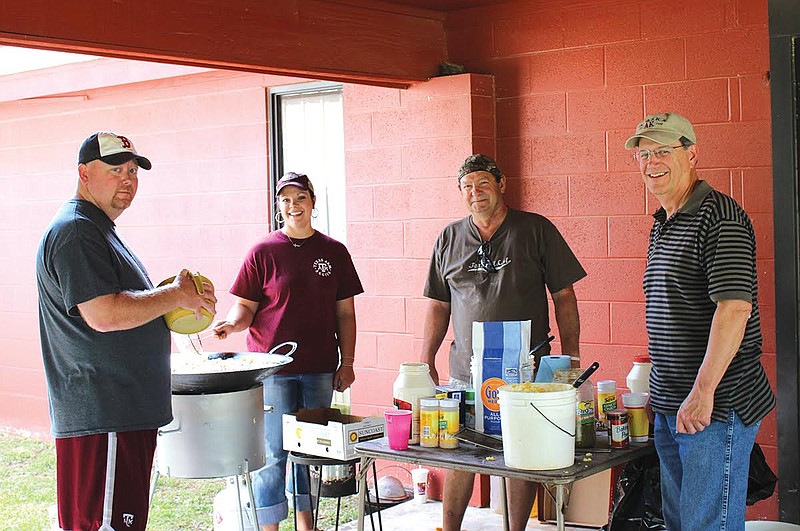 Kyle Dooley, Lea Dooley, Randy Pirkey and Jerry Peek cook the world-famous hushpuppies every year for the Hubbard Fish Fry. This group is also family. Lea and Kyle Dooley are Randy Pirkey's daughter and son-in-law, and Jerry Peek is his brother-in-law. 