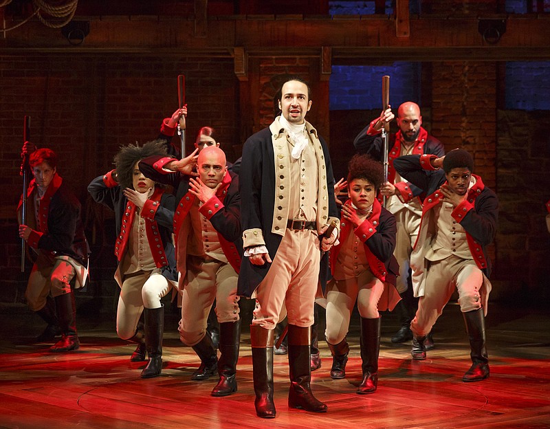 This image released by The Public Theater shows Lin-Manuel Miranda, foreground, with the cast during a performance of "Hamilton," in New York. "Hamilton," the hip-hop stage biography of Alexander Hamilton won the 2016 Pulitzer Prize for drama on Monday, April 18, 2016. 