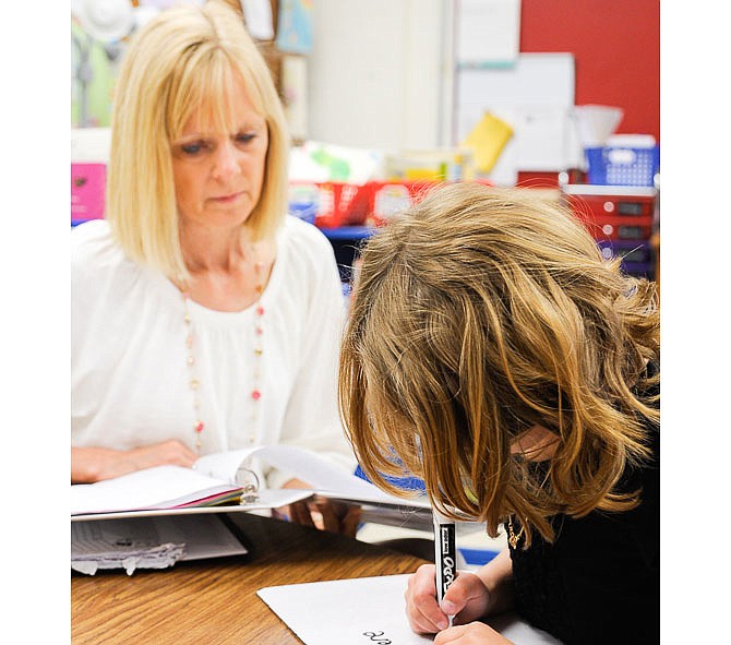 California 2016 Teacher of the Year Jennifer Dampf works with one of her second-grade students.