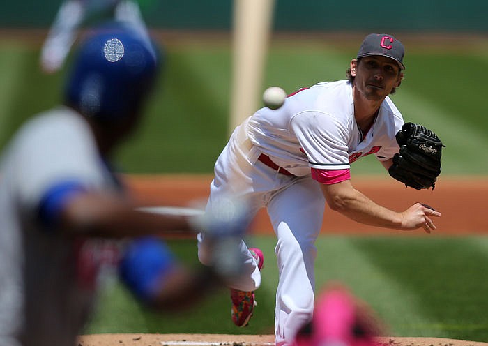 Cleveland Indians Josh Tomlin pitches during the first inning of a baseball game against the Kansas City Royals, Sunday, May 8, 2016, in Cleveland.