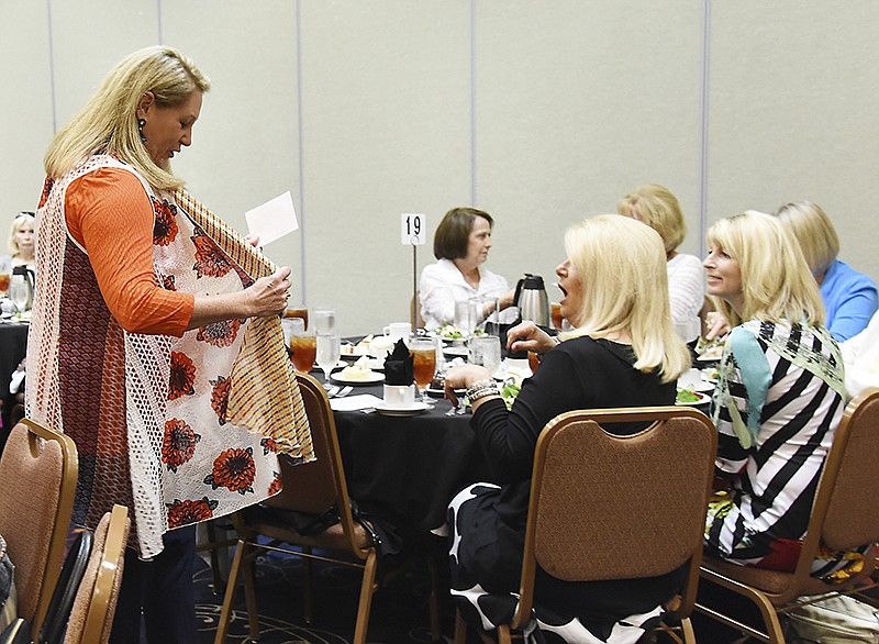 Holley Smothers models an outfit from Saffees at the annual Cole County Historical Society Fashion Show and Luncheon May 9 at the Capitol Plaza Hotel.
