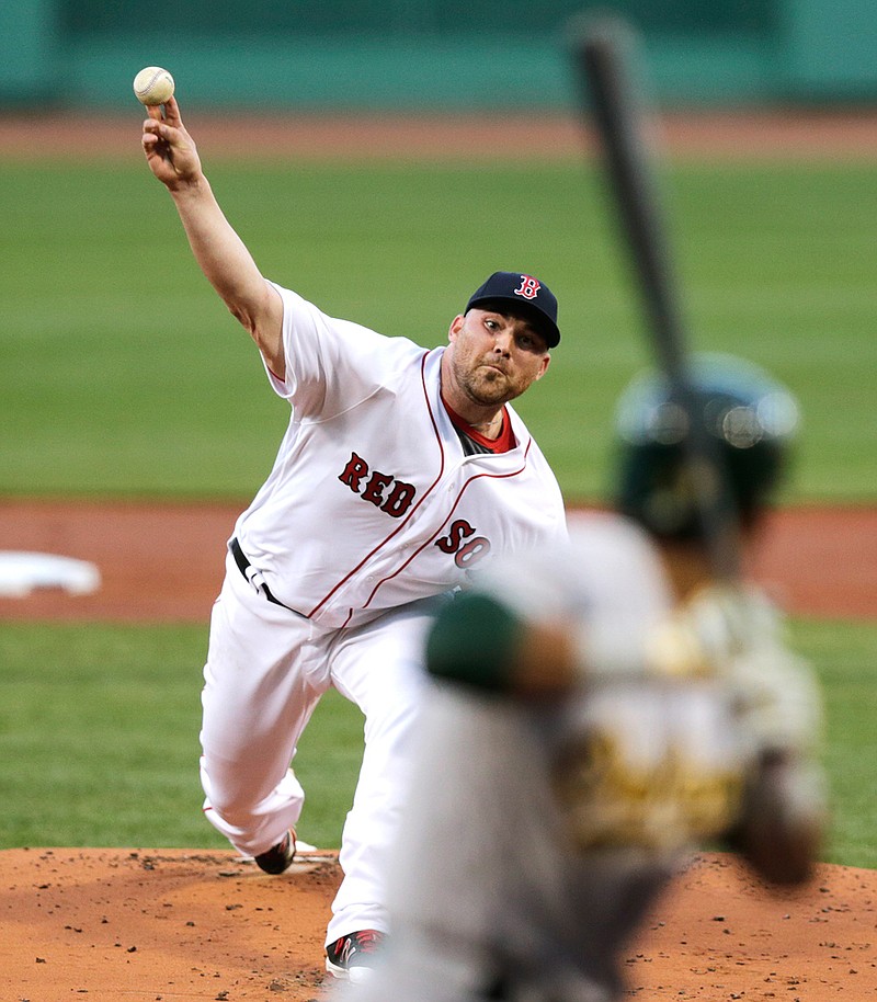 Boston Red Sox starting pitcher Sean O'Sullivan delivers during the first inning of a baseball game at Fenway Park in Boston, Tuesday, May 10, 2016.