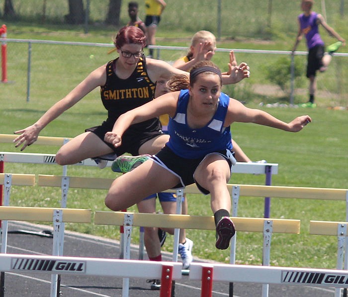 Mickayla Strother of Jamestown leaves the pack behind in the 100 Meter Hurdles on Saturday at the Class 1 District 6 meet in Cleveland, Mo.