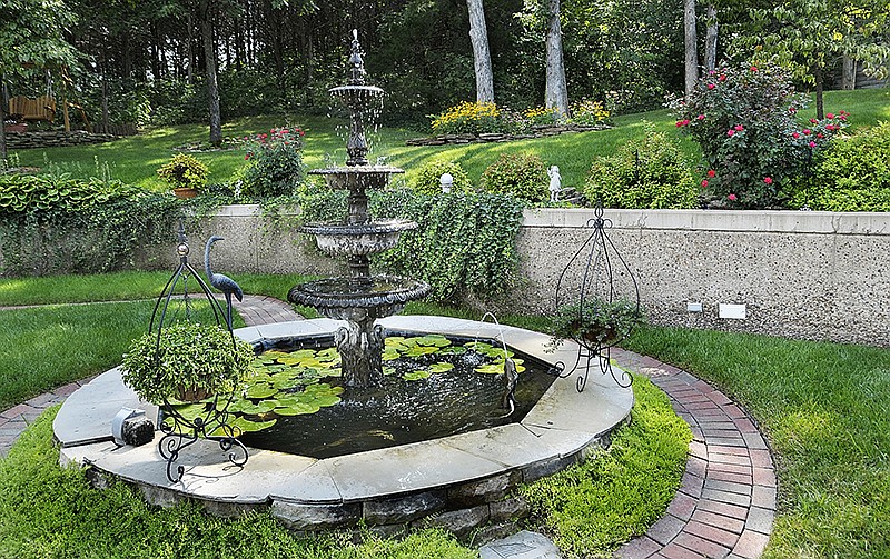 Charlie and Claudia Goodin are 2015 recipients of the Yard of the Month Award during the water feature-themed month. 