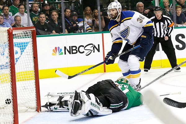 St. Louis Blues right wing Troy Brouwer (36) scores a goal against Dallas Stars goalie Antti Niemi (31) during the second period of Wednesday night's Game 7 of the Stanley Cup Western Conference semifinals in Dallas. 