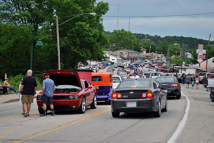 Thousands turned out for the first 2016 Hot Summer Nights event Friday at the Lake of the Ozarks to view classic and custom cars, interact with family entertainers and celebrate historic Route 66.