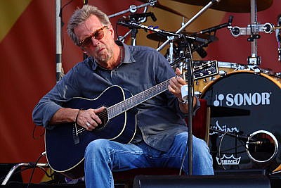 In this April 27, 2014 file photo, Eric Clapton performs at the 2014 New Orleans Jazz & Heritage Festival at Fair Grounds Race Course  in New Orleans. Clapton's new album, "I Still Do," will be released on Friday.