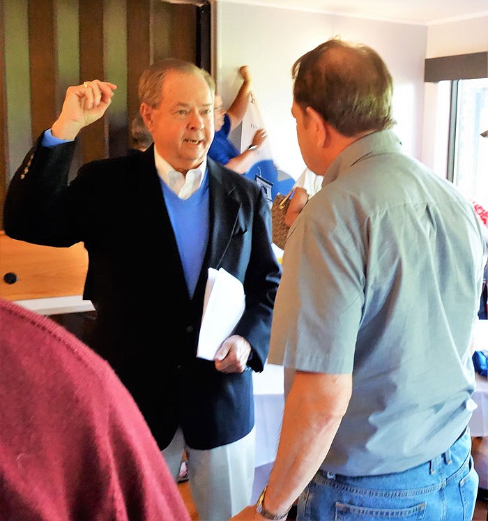 Tom Thomas talks to members of the Rotary Club in Fulton on Wednesday. The club meets weekly at the Fulton Country Club.