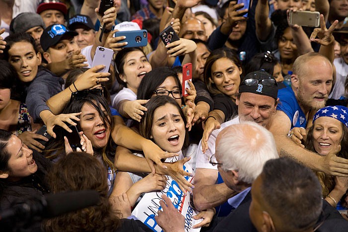 Democratic presidential candidate Sen. Bernie Sanders, I-Vt., greets supporters after speaking at a rally on Tuesday, in Carson, California.