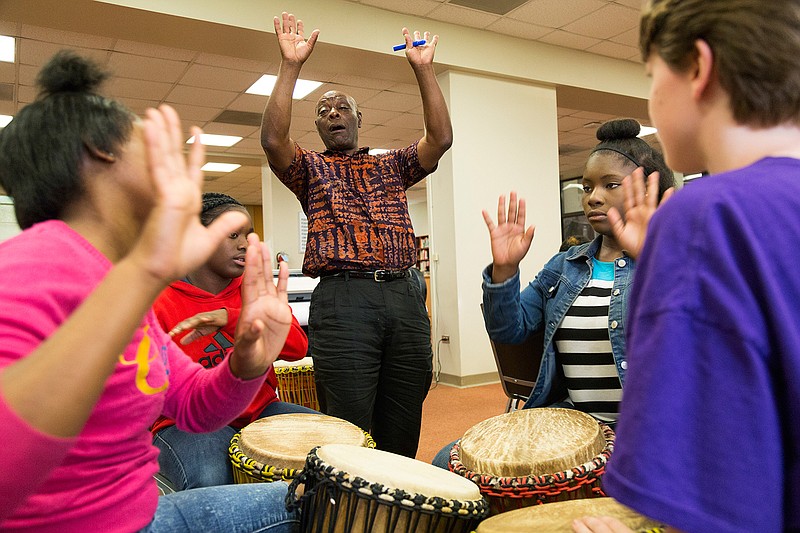 Zinse Agginie directs students Friday, May 20, 2016 at Washington Academy on the choreography for what he calls "drum ballet." "Drumming brings out the best in everyone," Agginie said. Agginie teaches African drumming across Arkansas and was brought to Texarkana, Ark., as part of the Texarkana Regional Arts and Humanities Council's ArtSmart program.