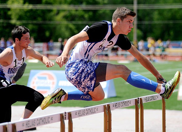 Tristan Little of Russellville competes Friday in the preliminaries of the Class 2 boys 110-meter hurdles at Adkins Stadium.