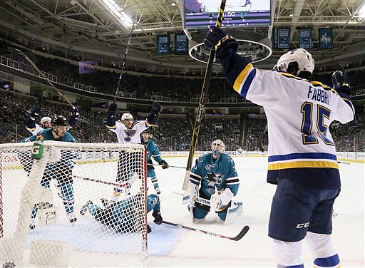 St. Louis Blues center Jori Lehtera, cneter, reacts after scoring past San Jose Sharks goaltender Martin Jones on a rebound of a shot by center Robby Fabbri, right, during the first period of Game 4 of the NHL hockey Stanley Cup Western Conference finals, Saturday, May 21, 2016, in San Jose, Calif.